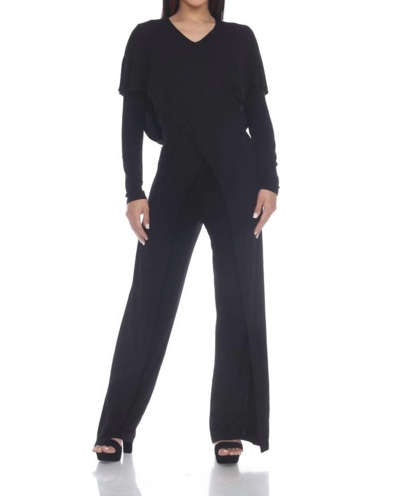 Front of a model wearing a size L Sunny Slenderizing Winged Jumpsuit in Black in Black by One Essence. | dia_product_style_image_id:343297